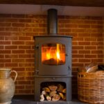 Poêle mixte bois & granulés : l’élégance du chauffage hybride à vivre poele à bois traditionnel
